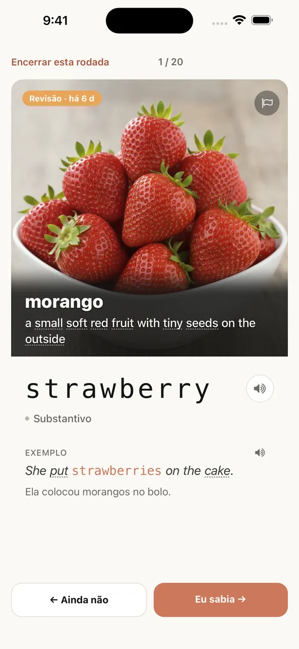 Tela do app depois de ver a resposta: a palavra é strawberry (morango), com uma frase de exemplo e a tradução em português.